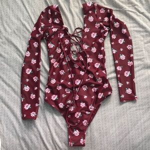 Volcom long sleeved one piece